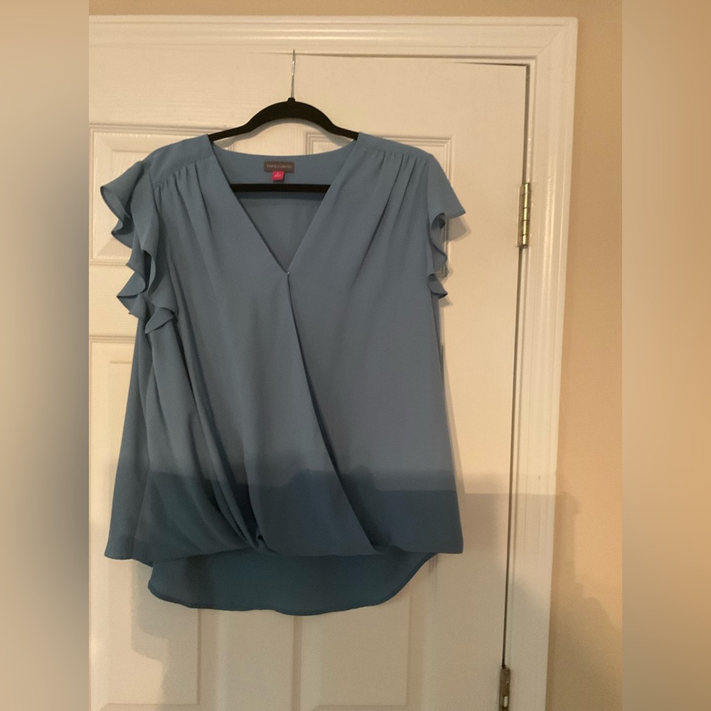 The most gorgeous perfect sky blue; wrap blouse. Size large or 14.